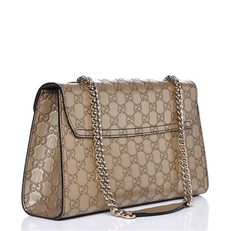 gucci phoebe gold embellishment|GUCCI Microguccissima Medium Emily Chain Shoulder Bag.